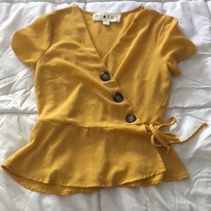 Hiatus yellow wrap top